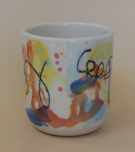 Handmade Ceramic Cup- doodles on colorful background-lines